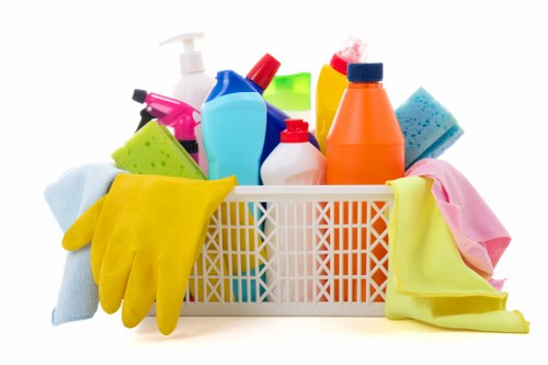 Professional cleaners in Harrow servicing a bright residential living room
