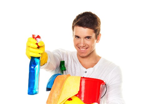 House cleaners in Harrow vacuuming a family home